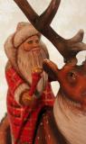 Santa Claus  with a deer
