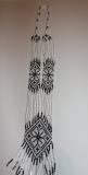 A black and white herdan, beaded necklace